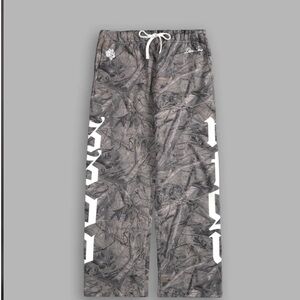 DARC SPORT X OUR MANTRA DRIFTWOOD FOREST CAMO BIGELOW SWEATPANTS